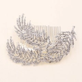 Detailansicht des silbernen Brauthaarkamms mit glitzernden Blättern und Intarsien-Strass - Silber