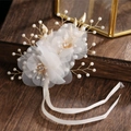 Accessoire cheveux mariée élégant avec fleurs en résille, perles et feuilles d'or - Fleur de Poignet Champagne