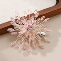 Detail of pink crystal flower hair clip featuring beaded petals and silver metal duckbill base - Pink