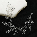 Accessorio capelli sposa argento con cristalli scintillanti su fondo in velluto nero - Argento