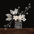 Macro detail of silver leaf bridal hair comb with pearls and crystals for wedding styling - Left Side (Silver)