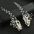 Detail of silver wire bridal hair clips with white pearls and marquise glass leaves - Silver