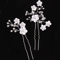 Juego de dos elegantes horquillas de novia con flores blancas y detalles de perlas - Plateado