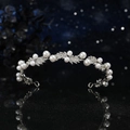 Elegant bridal tiara headband with white pearls and sparkling rhinestones on silver base - Silver