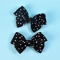 Detail of two black and white polka dot bow shoe clips for bridal wedding accessories - Bow / Small Polka Dot Black