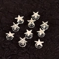 Set of 10 silver star hair coils with glitter finish for stylish DIY hair decoration - Silver
