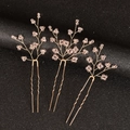 Détail de trois épingles à cheveux de mariée faites main avec fil doré et perles roses - Cristal Rose