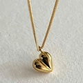 Collier avec pendentif cœur 3D minimaliste en finition dorée et chaîne élégante - Or