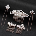 Detailed close-up of handmade rose gold bridal hair combs with elegant white pearls - Rose Gold Style