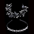 Elegant bridal hair accessories set with pearls and crystals on a sleek black background - Silver Assortment