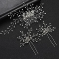 Three-piece bridal hair accessory set with silver wire flowers, rhinestones and pearls - Silver