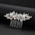 Detail of bridal hair comb featuring marquise crystals, white pearls, and silver base - Silver Pearl Hair Comb