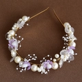 Detail of bridal hair vine with white flowers, resin petals and golden wire craft - Purple