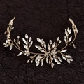 Exquisite handmade gold bridal headband with sparkling rhinestone flower and leaf motifs - Gold