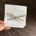Elegante fermaglio per capelli a croce dorata con due file di strass luccicanti - Oro