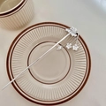 Elegant silver flower hair stick with tassel charms on a ceramic plate, ancient style - Silver (Silver Plated Copper)