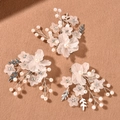 Detail of three floral hair pins with pink frosted petals and white faux pearls - Silver Wire (5248743470302)