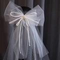 Elegant white bridal bow veil with pearls and layered mesh on a mannequin stand - 80cm-100cm / White