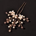 Forcina per capelli sposa a U dorata con cristalli rosa e perle su fondo nero - Rosa Strass