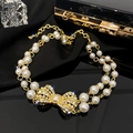 Élégant collier de perles double épaisseur avec pendentif nœud strass doré de luxe - Collier Double Couche avec Nœud (Style 1)