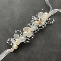 Handmade bridal wrist flower headband with pearls, orange beads, and blue petals - Bracelet (Short) / Blue