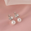Elegant silver bow hoop earrings with white shell butterflies and round hanging pearls - Silver