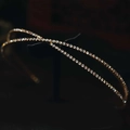 Elegante cerchietto incrociato a doppio strato in oro con strass lucidi e micro-incastonati - Oro KC
