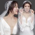 Detail of elegant double-layer white bridal veil and silver leaf rhinestone hairclip set - Style 7 Sequins Large Mesh
