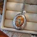 Close-up of vintage locket necklace with dried flowers and pearl in a jewelry box - Amber Resin Dried Flower Oval Style (A)
