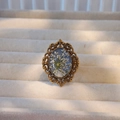 Macro shot of handmade vintage bronze ring with white lace flower in blue resin oval - Adjustable / Bronze Light Blue White Lace Style (Type D)