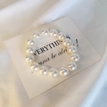 Elegant Korean style crystal pearl hair tie and beaded bracelet in warm white finish - Pearl Style