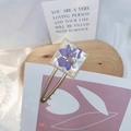 Detail of square hair clip with purple dried flowers and pearls on wooden base - Square Style