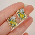 Exquisite handmade dried flower earrings with golden star and blue resin inlay - Star Decoration Style (Style A)
