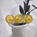 Detail of resin hair clip with dried flowers, gold leaf, and light blue bow tie ribbon - Yellow Hair Clip