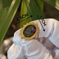 Detailed macro of oval vintage floral resin ring featuring purple real dried flowers - Purple Flower Specimen Style (Type A)