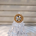 Detail of vintage gold ring with white flower center and sunburst texture - White Flower Black Base Style (Style A)