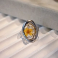 Detailed close-up of handmade stainless steel ring featuring yellow dried flower resin inlay - Yellow Style