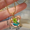 Detail view of handmade oil painting floral pendant with dimensions 2.5cm by 2cm - Irregular Shape Pink Dried Flower Style (Type D)