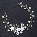 Handmade bridal headband with white pearls, crystals, and resin flowers on gold wire - Gold
