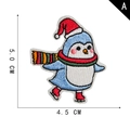Christmas penguin embroidery patch in skating pose with red hat and scarf 5.0x4.5cm - Skating Penguin Style (A)