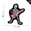 Rock skull guitarist embroidered patch in black and white with a pink electric guitar - Skeleton Guitarist (38)