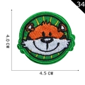 Cartoon tiger embroidered patch with yellow sun rays and green border in 4.5x4.0 cm size - Tiger Head with Green Border (P20200030306)