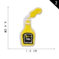 Embroidered yellow wine bottle patch variant measuring 4.4 cm by 1.8 cm on white background - Yellow Bottle Style (2*)