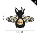 Detailed bee embroidery patch in black and orange thread for apparel decoration - Bee Embroidery