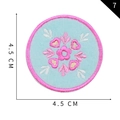 Round 4.5cm embroidered flower patch with pink heart details on light blue felt base - Heart Arrow Round Floral (G)
