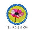 Round pink flower embroidery patch with blue polka dot border, 5.0x5.0 CM size - Pink Flower on Yellow Background Style (13)
