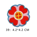 Pink heart flower embroidered patch with blue border and yellow center, 4.2x4.2 cm - Red Heart Petals Style (39)