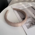 Elegant wide padded sponge headband with black polka dots on beige fabric textile - Khaki