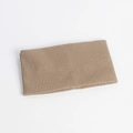 Detailed view of light camel ribbed knit headband with elastic texture and soft fabric - Camel