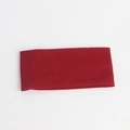 Detail of burgundy knitted headband featuring soft ribbed texture for winter fashion - Red